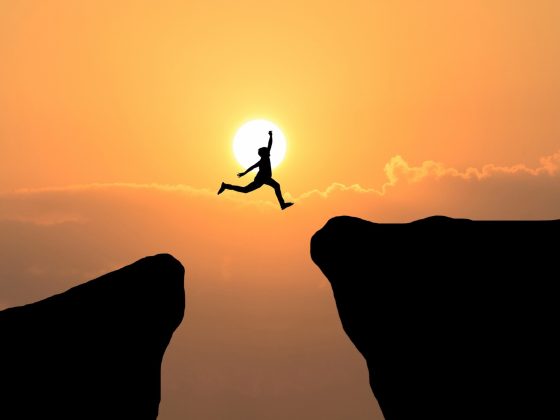 illustrating the evolution from IT operator to IT analyst by jumping from 1 mountain to another